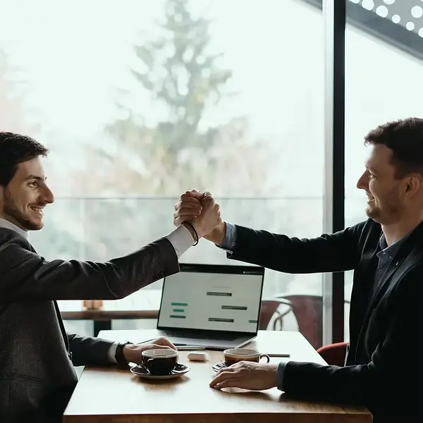 two-business-men-celebrating-deal_158595-5256